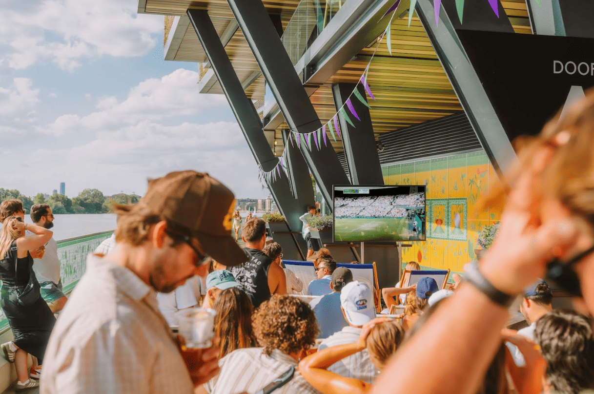 The cover image for the event: Join us for game, set, match as we play all the big games on the screens around Riverside Market. 