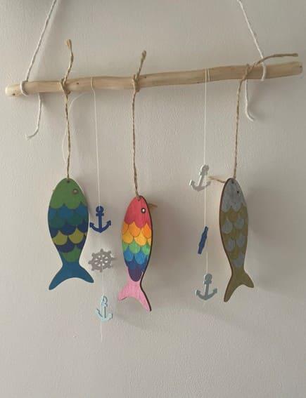 The cover image for the event: Let children get creative with our Seaside Mobile making, where they can design, decorate and take home their own colourful creations.