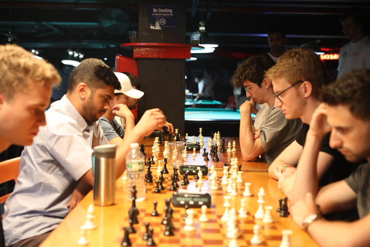 The cover image for the event: Join Chess on the Thames at Fulham Pier, featuring a rated rapidplay tournament, casual games, prizes and opportunities for players of all levels.