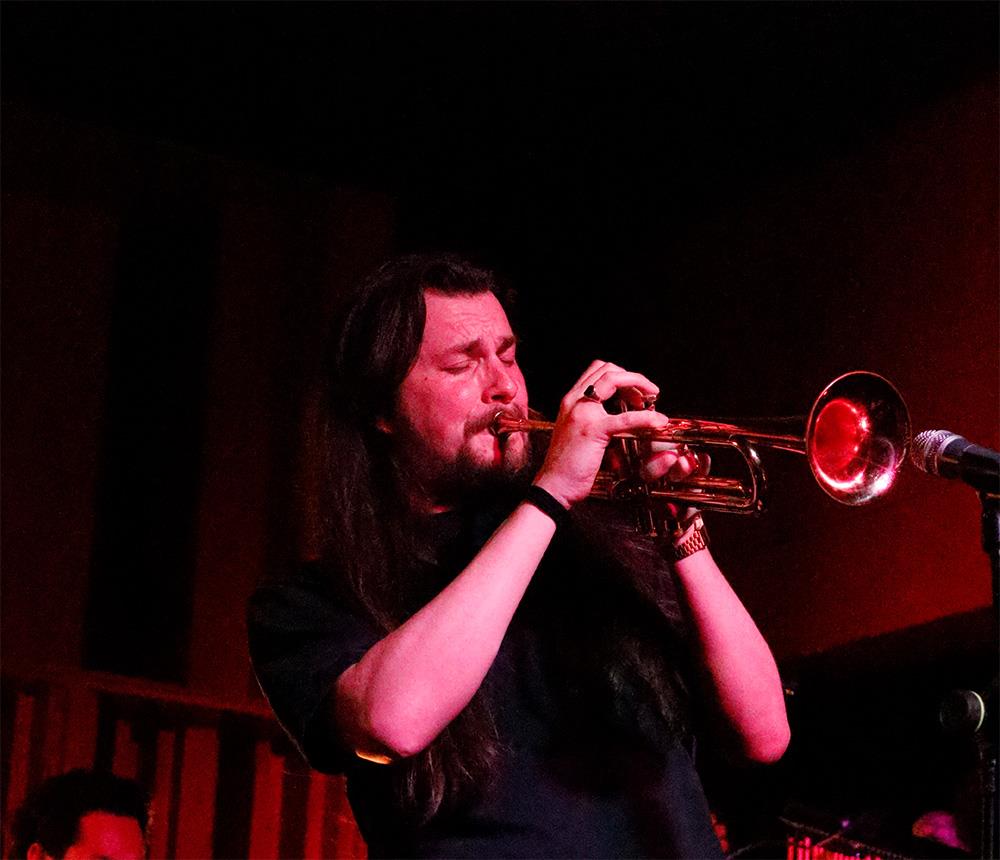 The cover image for the event: Ease into the weekend as Jazz Box returns to Orange Box at Fulham Pier for an evening of exceptional live jazz.