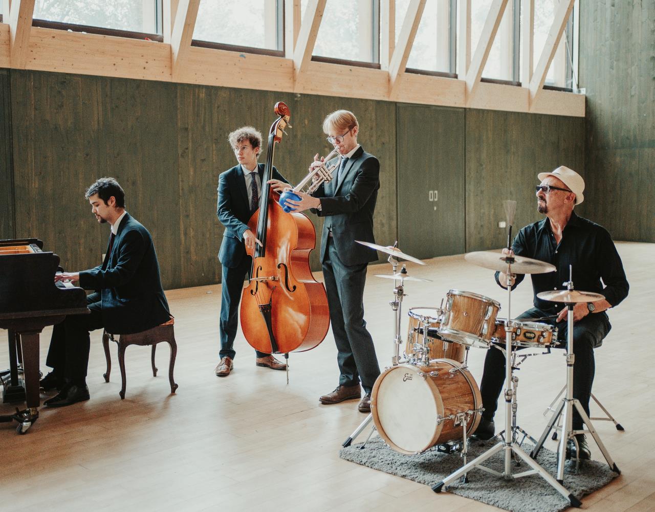 The cover image for the event: Join us for an unforgettable afternoon of live jazz on the riverfront! 