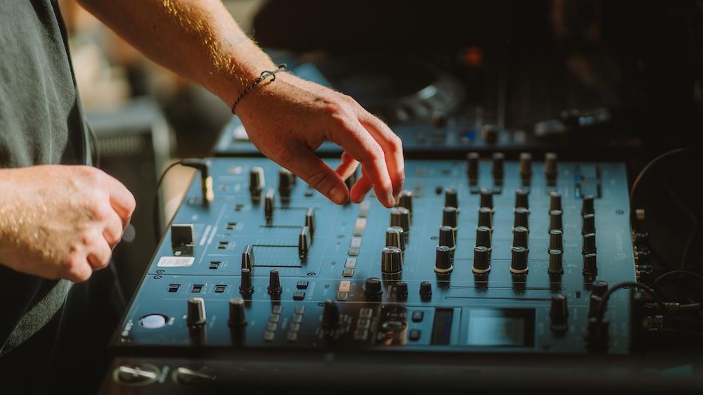 The cover image for the event: Step into the world of analogue sound with our Vinyl DJing Masterclass, led by our expert DJs, Gordon and Gillian. 