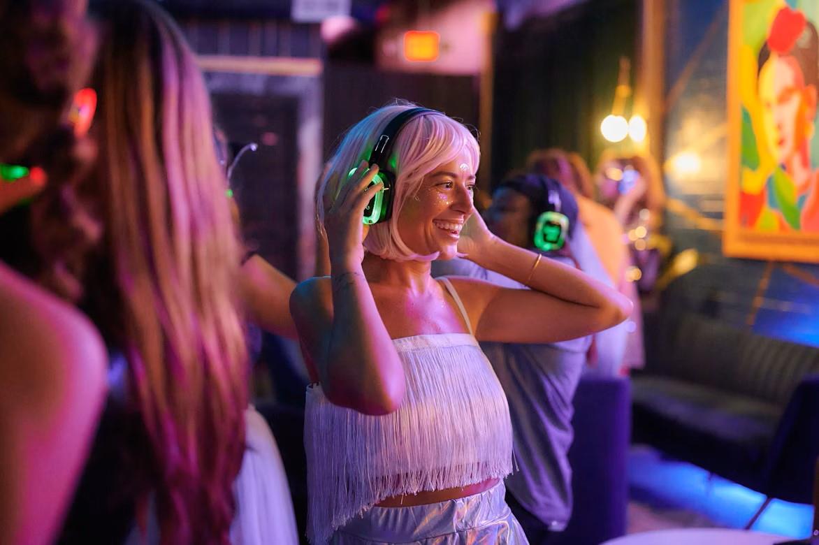 The cover image for the event: Dress in your spookiest costume and hit the dance floor at our family Halloween Silent Disco!